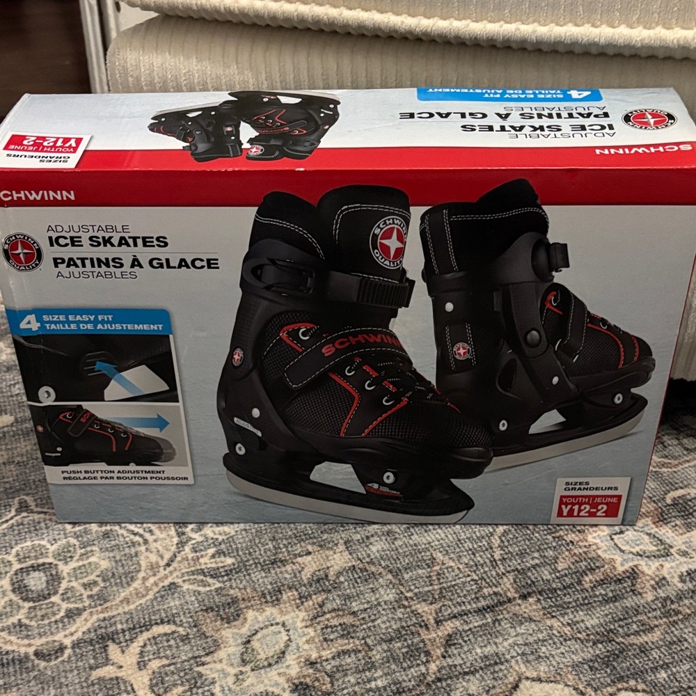 NET. Schwinn kids adjustable Black and Red Ice Skates, sizes kids 12-2